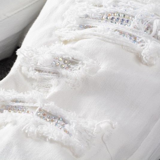 amiri white diamond hole jeans