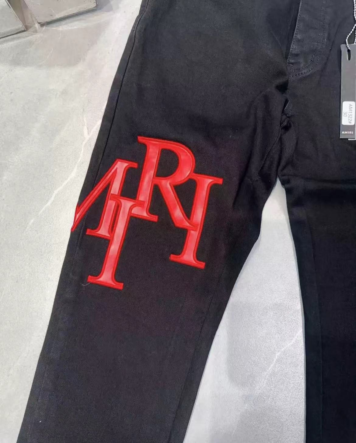 amiri balck and red logo jeans