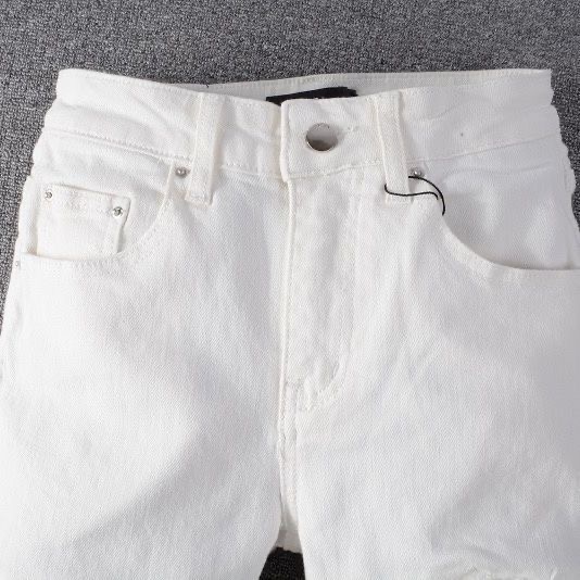 amiri white diamond hole jeans