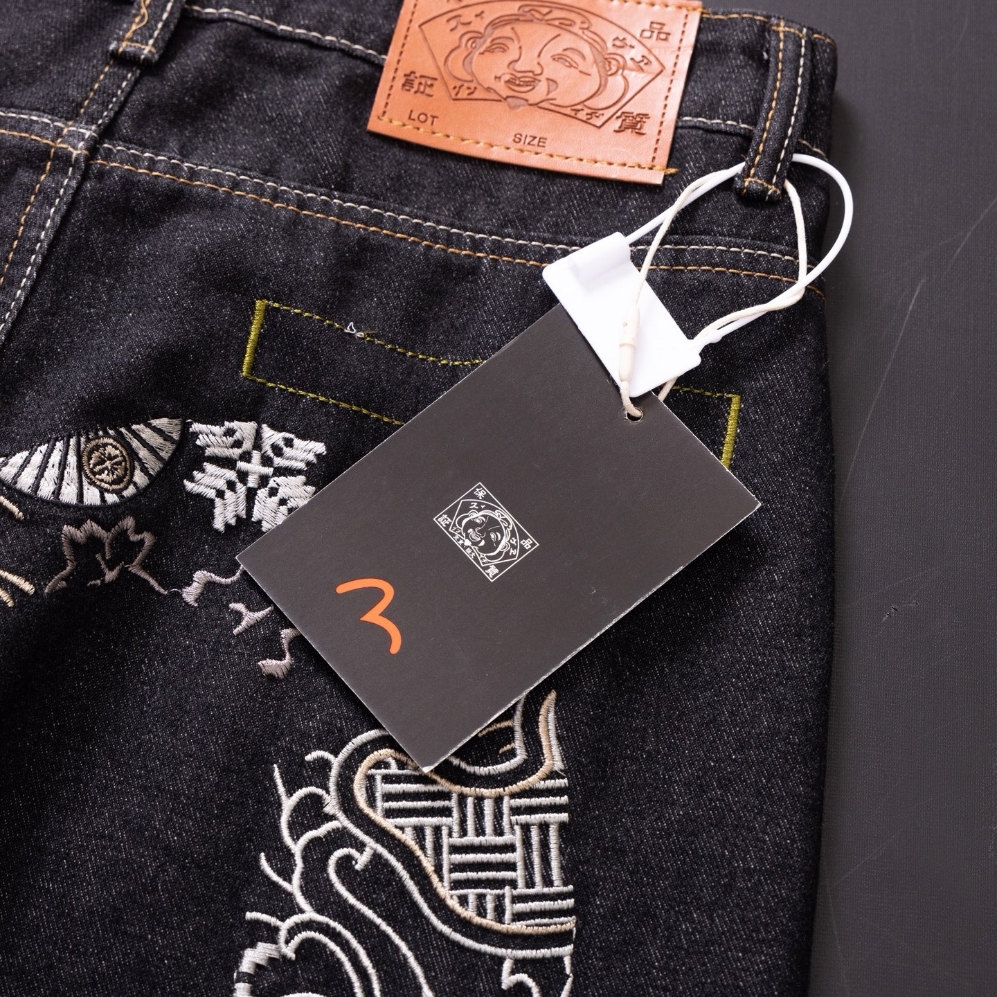 Evisu black macadamia flower jeans