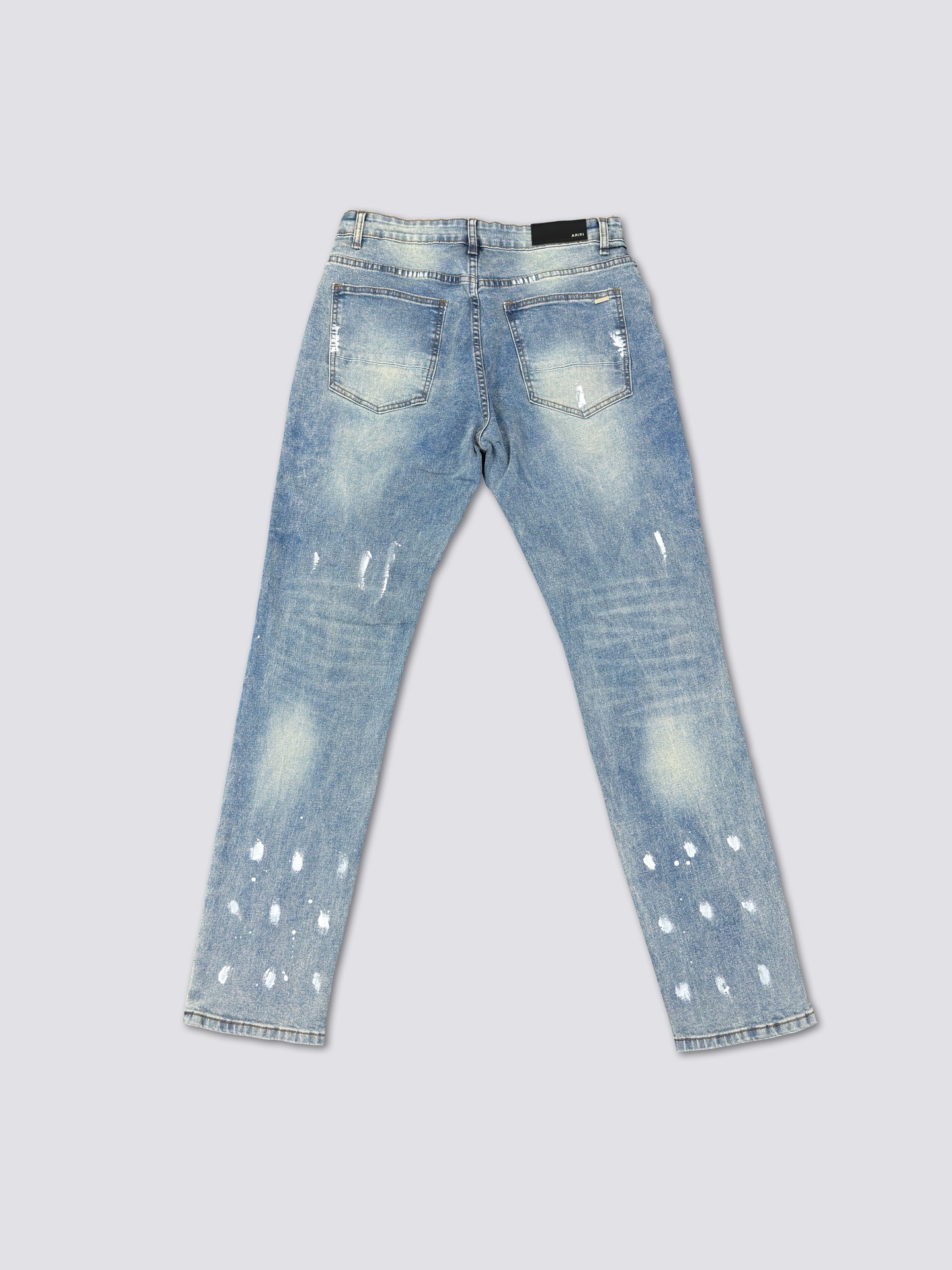 Amiri hole patched jeans