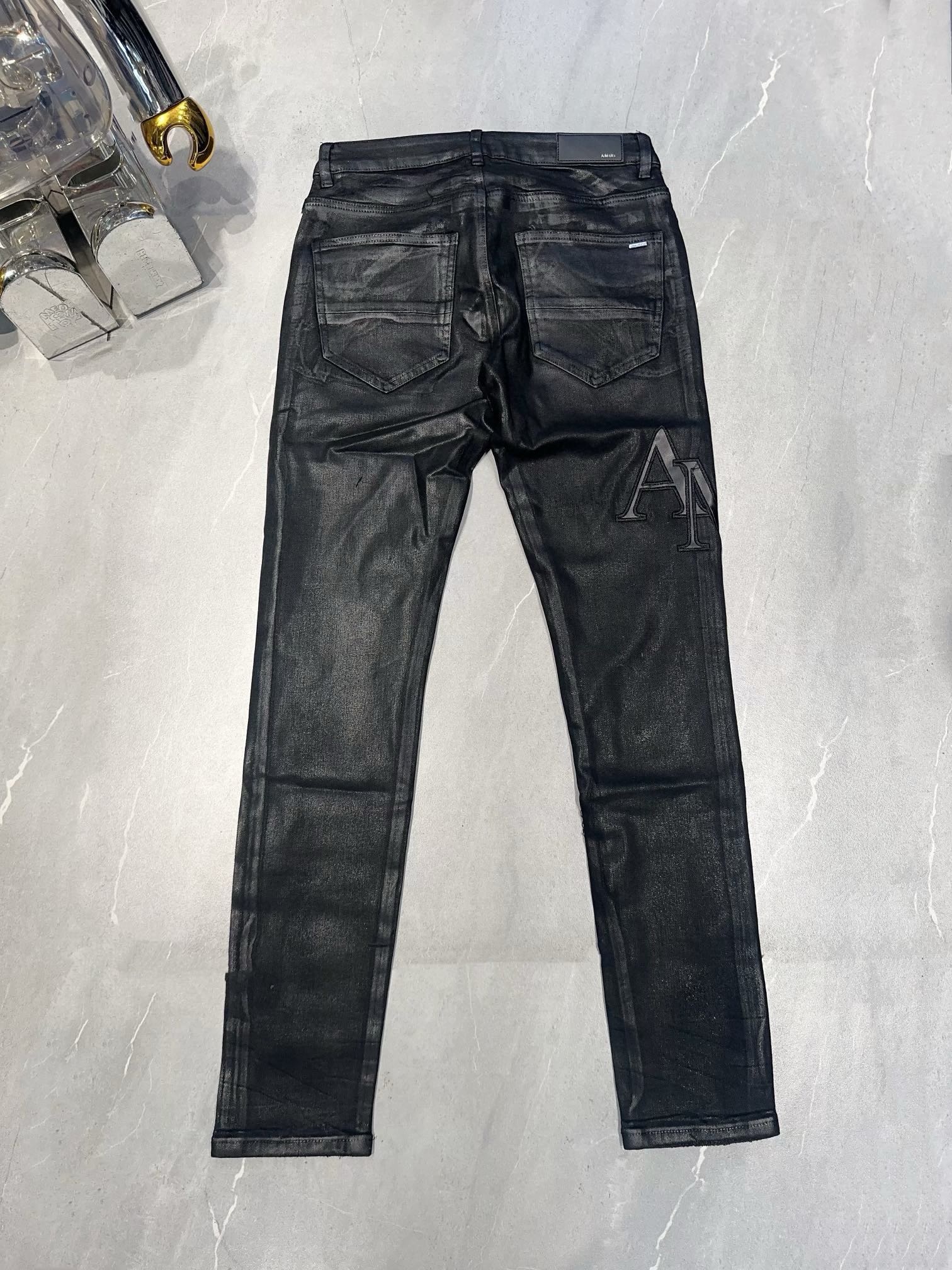 Amiri coating word Logo jeans