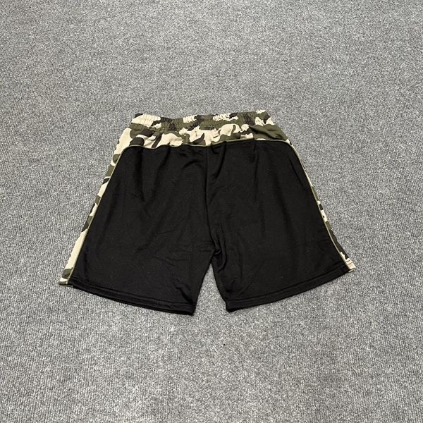 Broken planet embroidered logo camo shorts