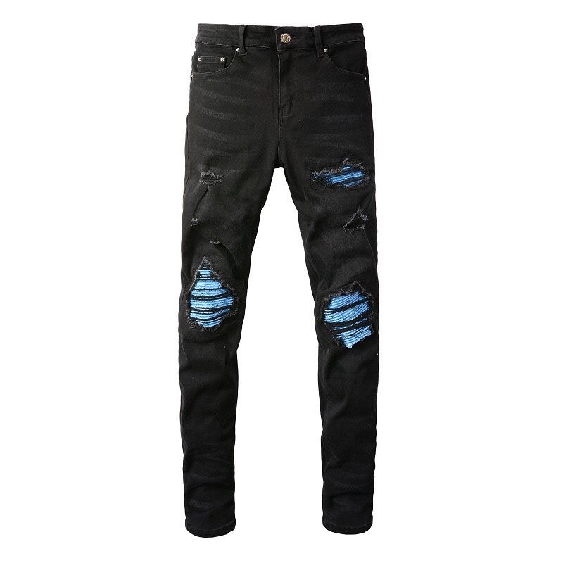 amiri distressed blue patch jeans.