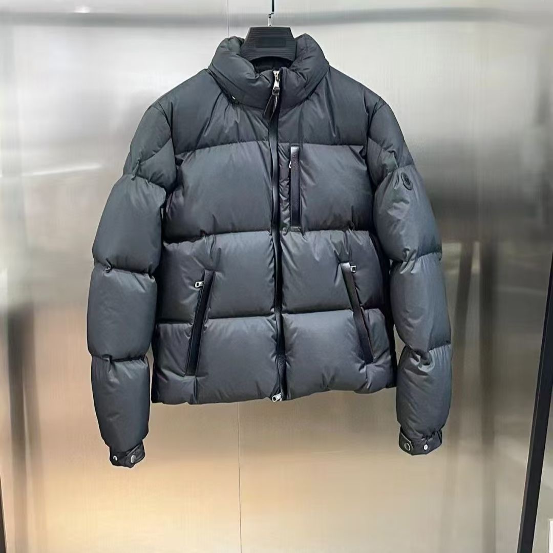 Moncler Stand-up collar, thick down jacket with duck down insulation.