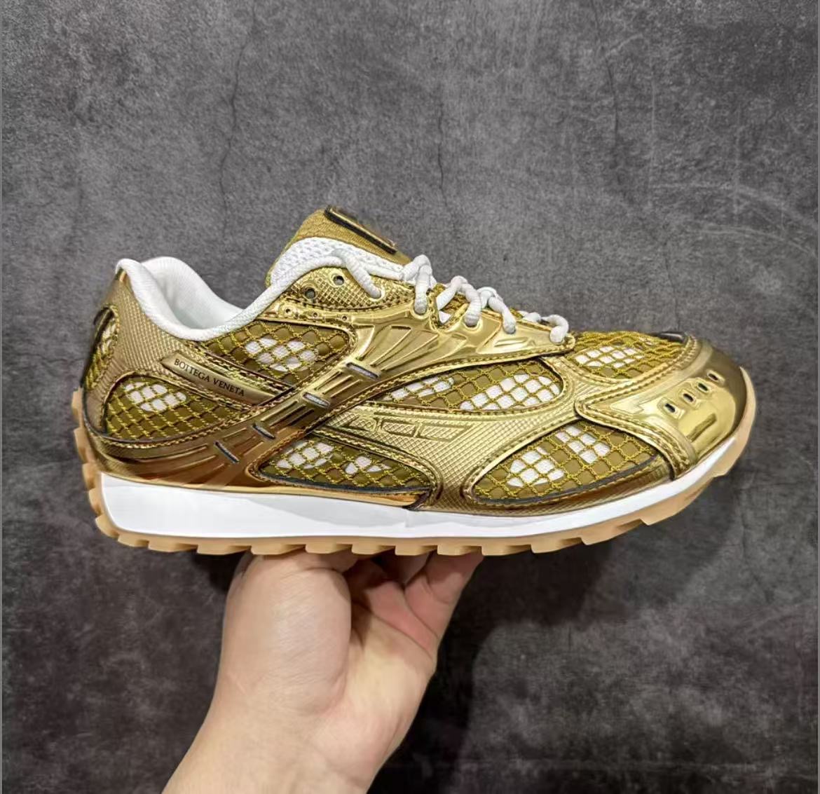 BOTTEGA VENETA Orbit Runner Gold Color