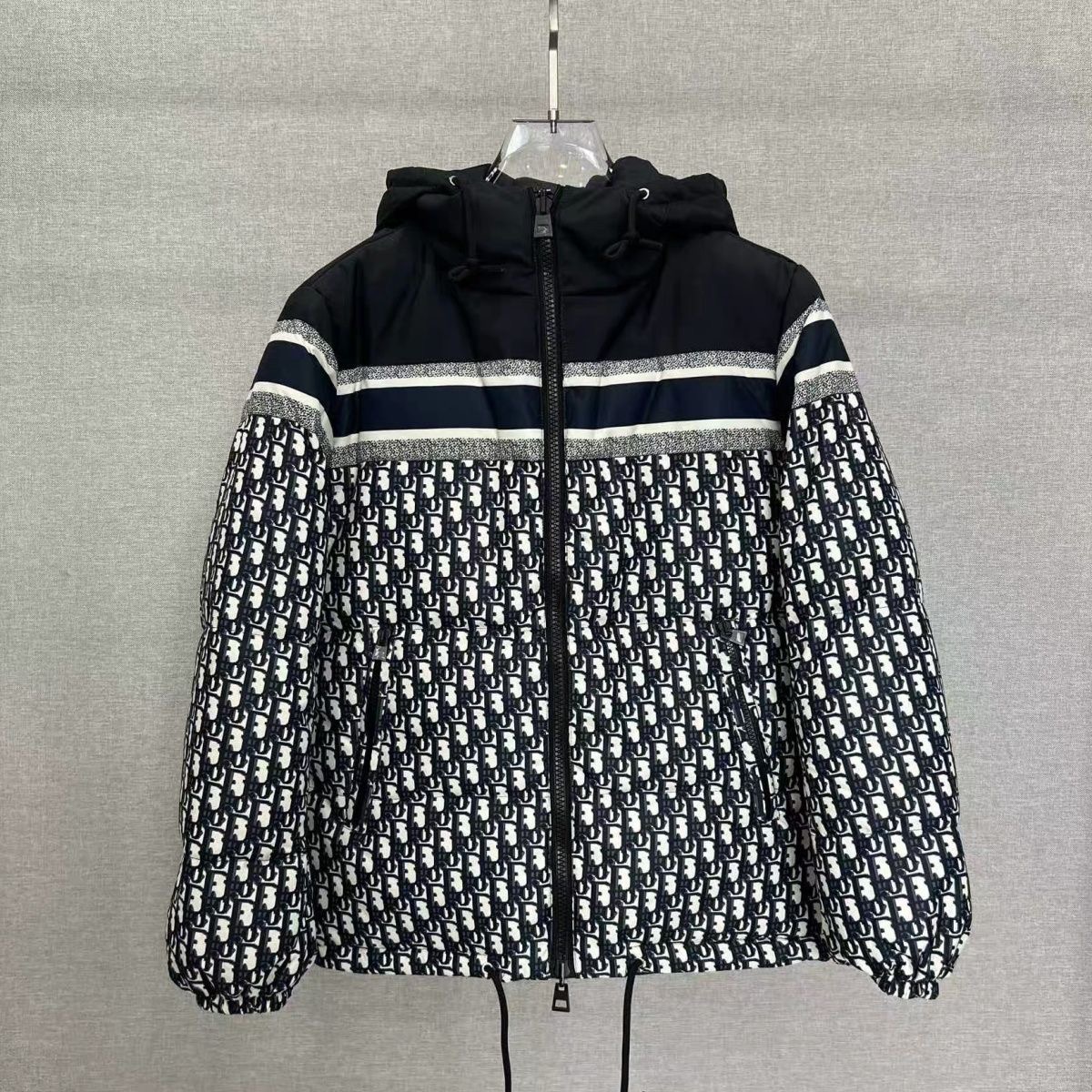 Dior full-print letter logo reversible hooded down jacket with zipper closure.
