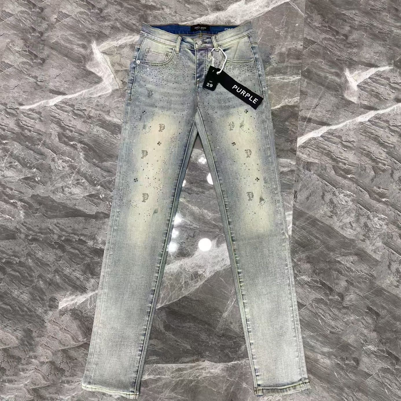 Purple sequined skinny jeans