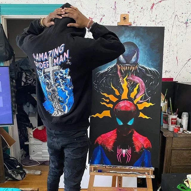 1:1 WL wearing a spiderman cotton tshirt