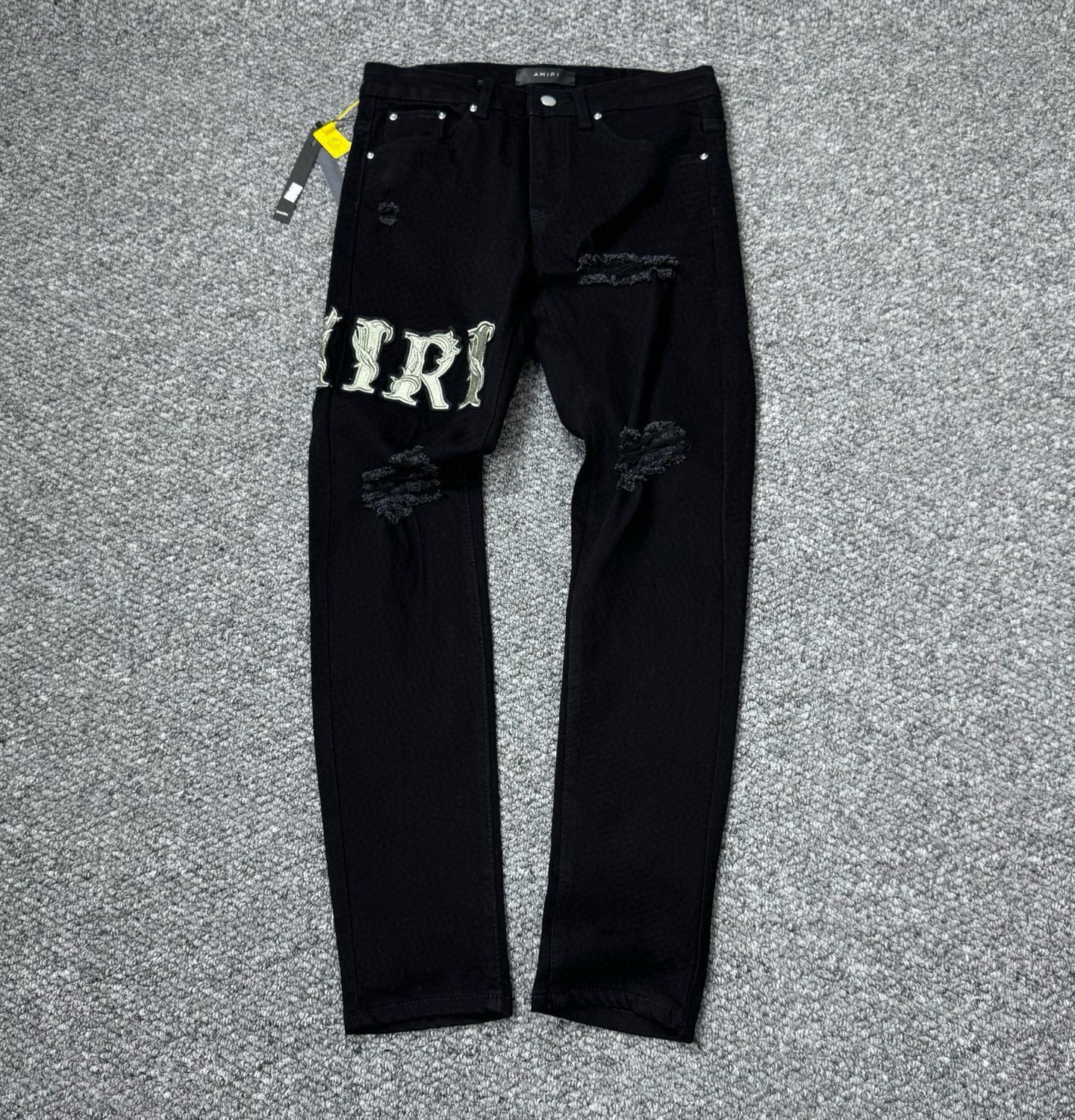 New released washing black ripped jeans
