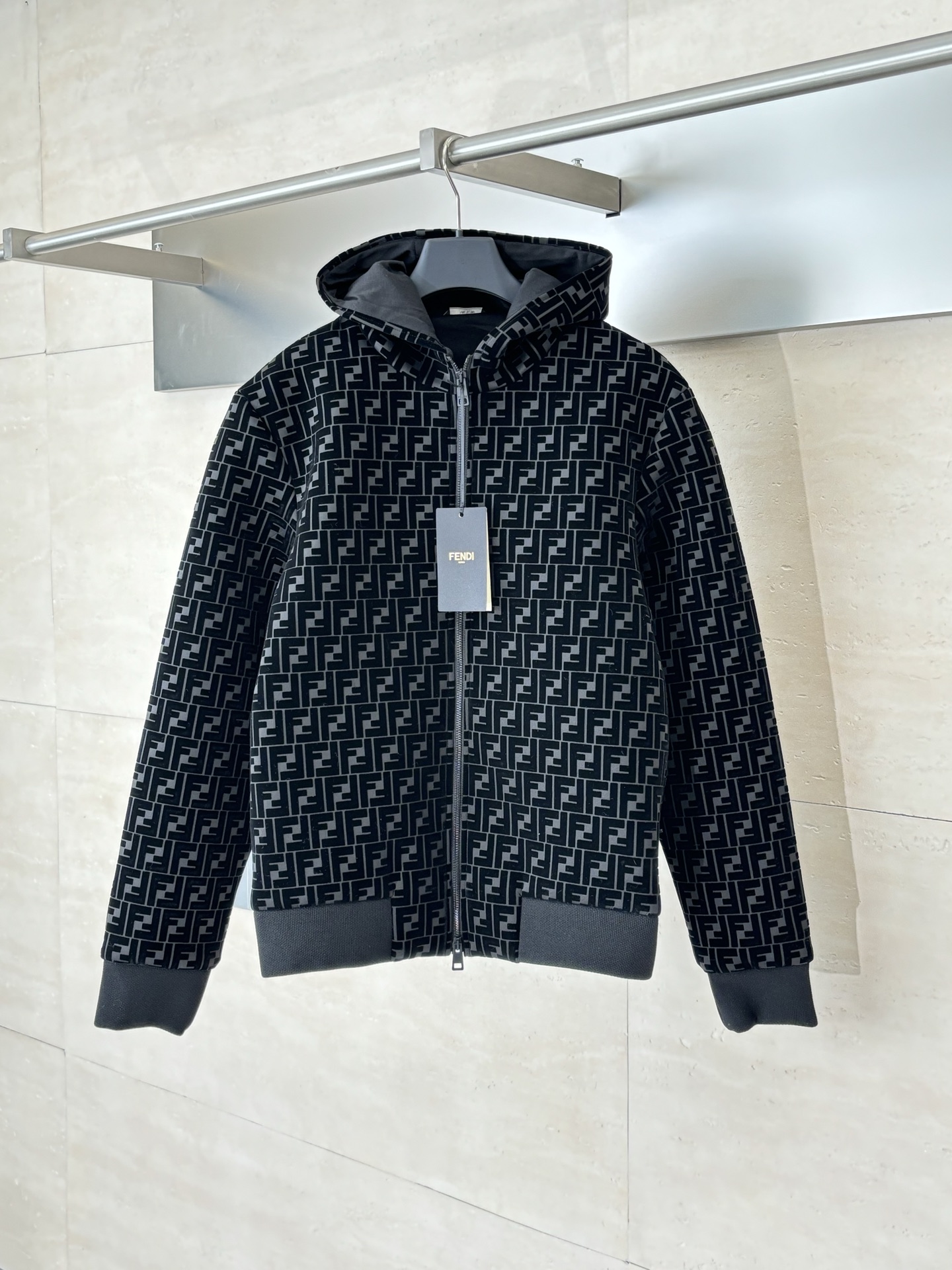 A full-print hooded jacket with embossed velvet