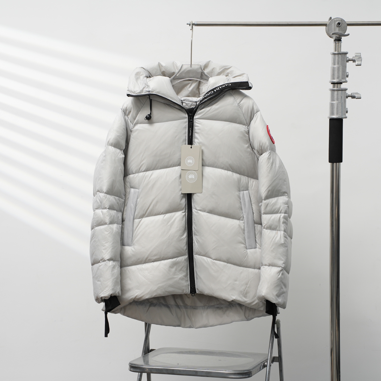 High-quality grey warm hooded down jacket