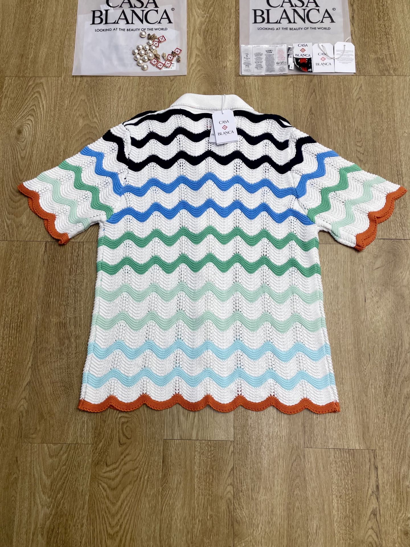 High density embroidery multi-color sweater short sleeved