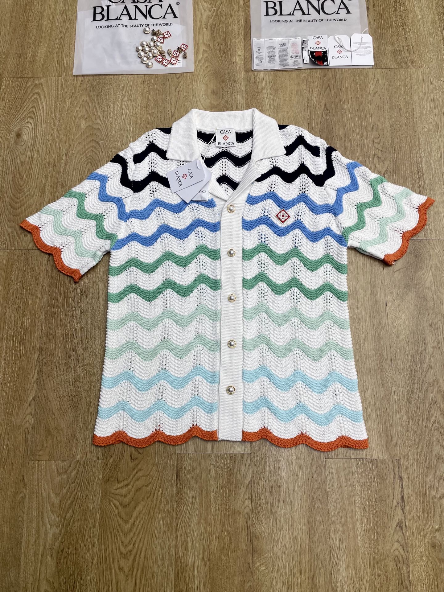 High density embroidery multi-color sweater short sleeved