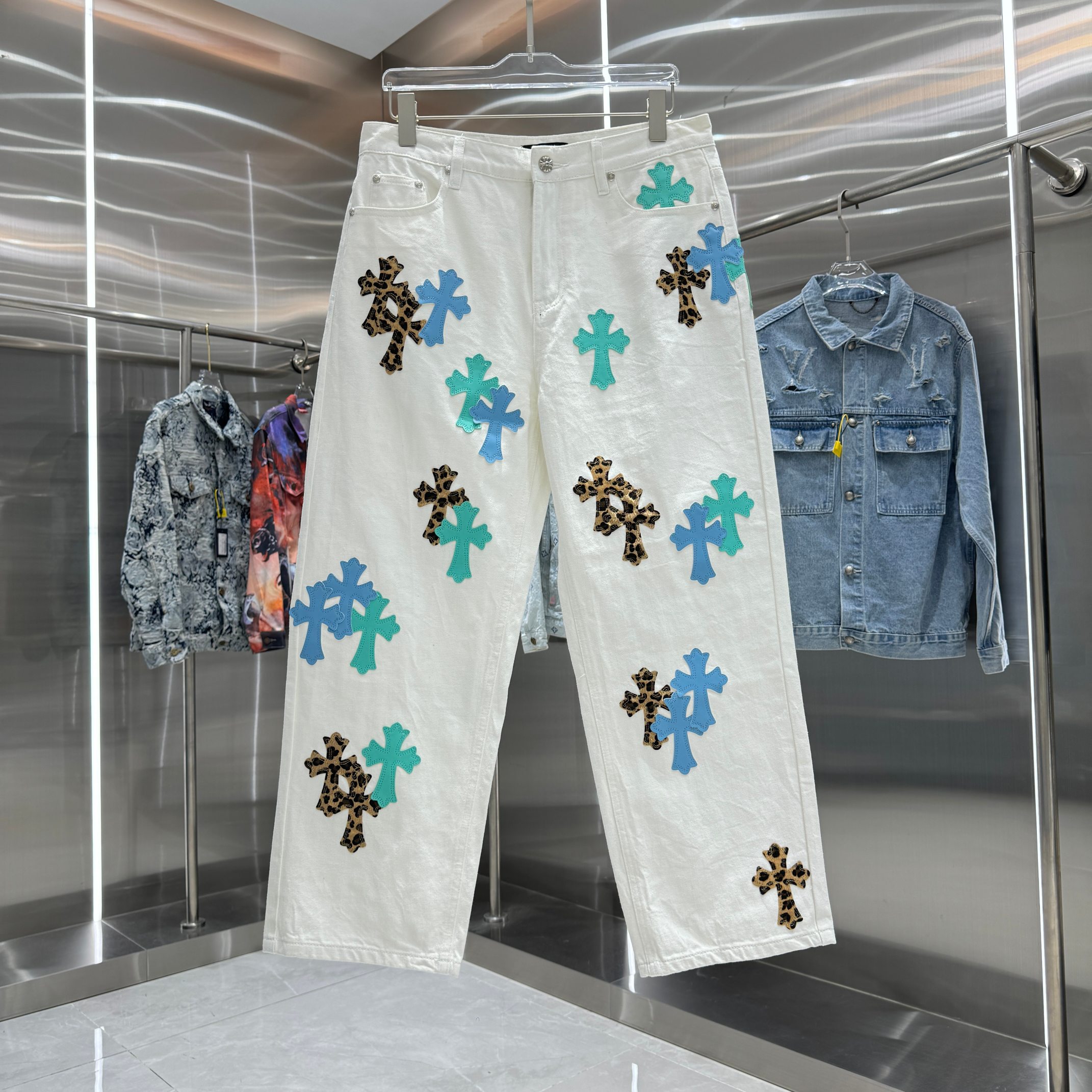 Cross leather straight-leg jeans