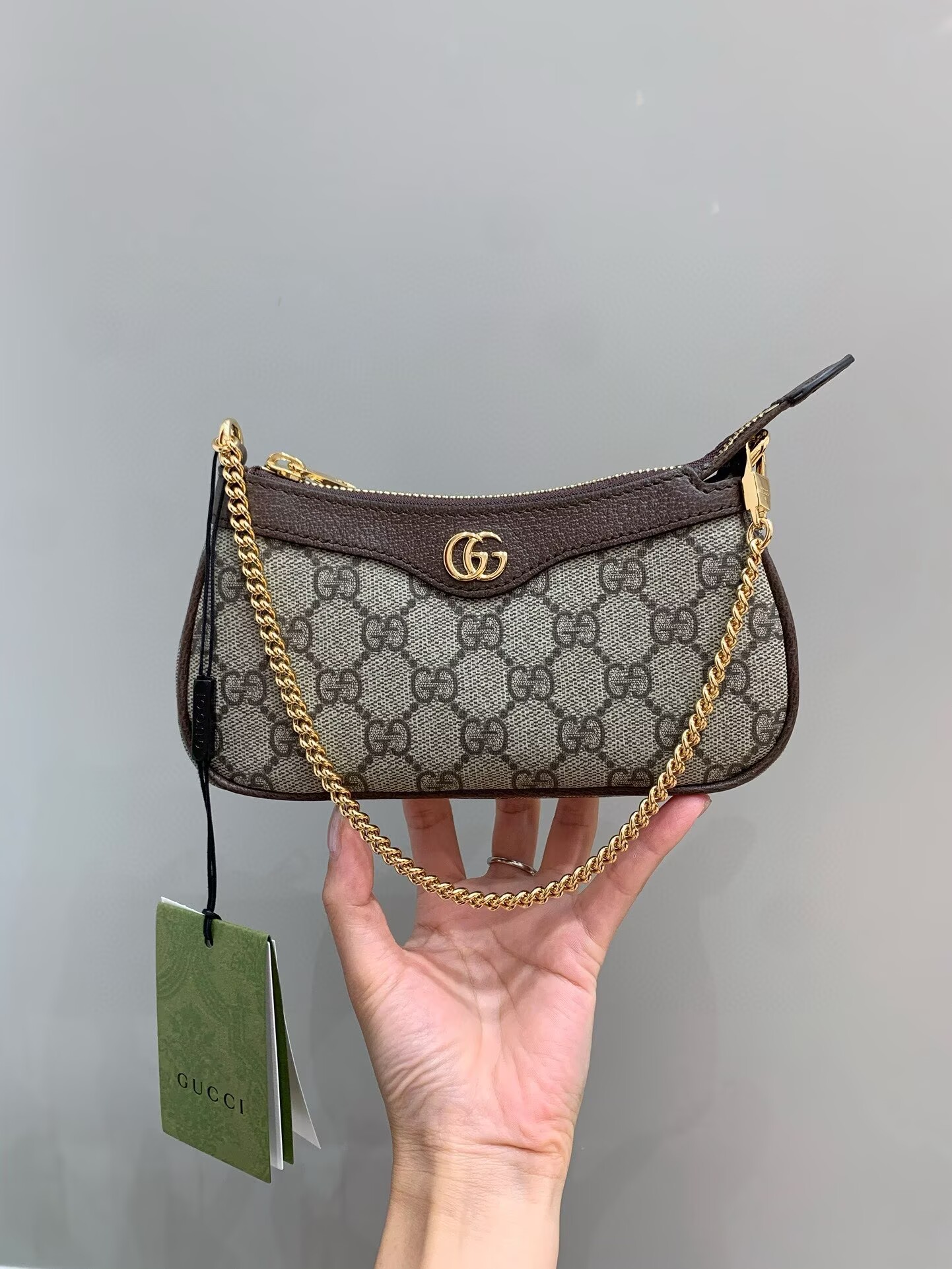 1:1 small handbag brown color