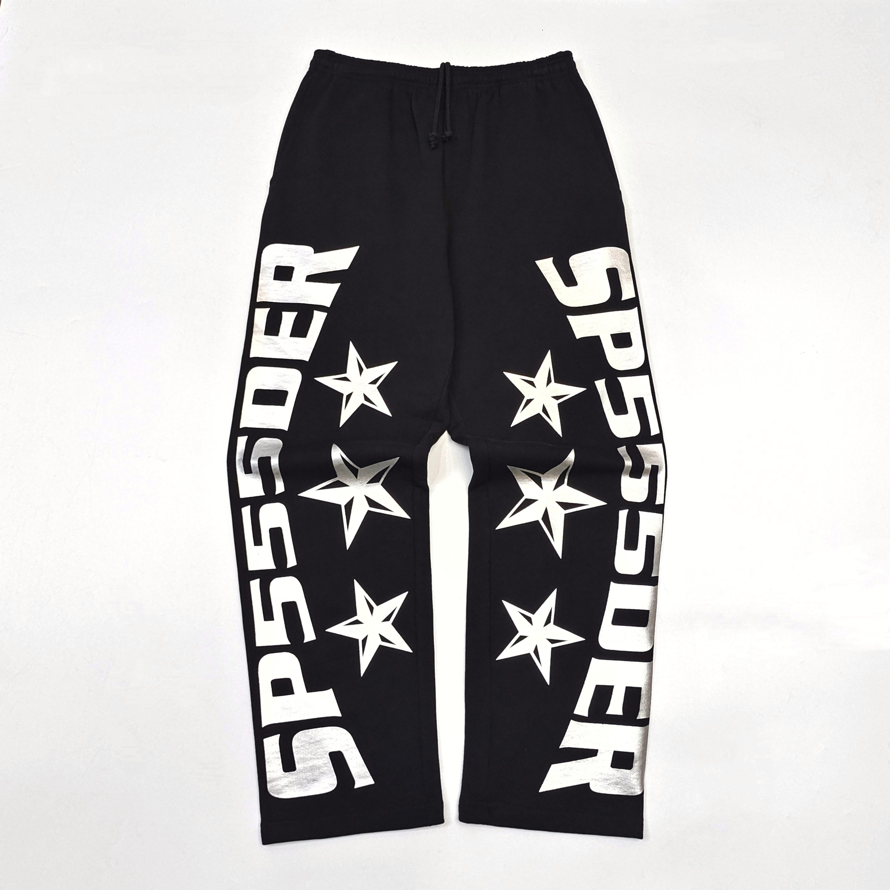 1: 1. Black straight leg pants with silver letters on the left and right legs