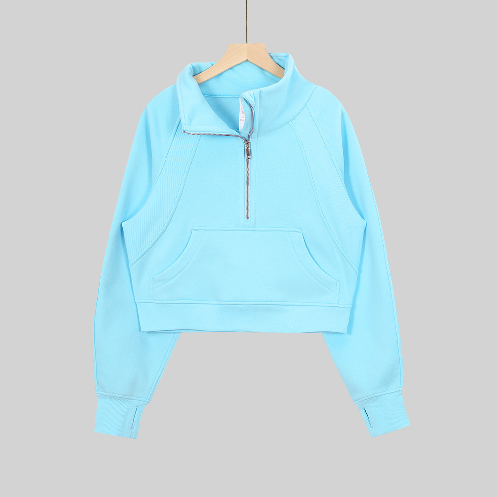 Sky blue button-down loose-fitting hoodie with half-zip closure
