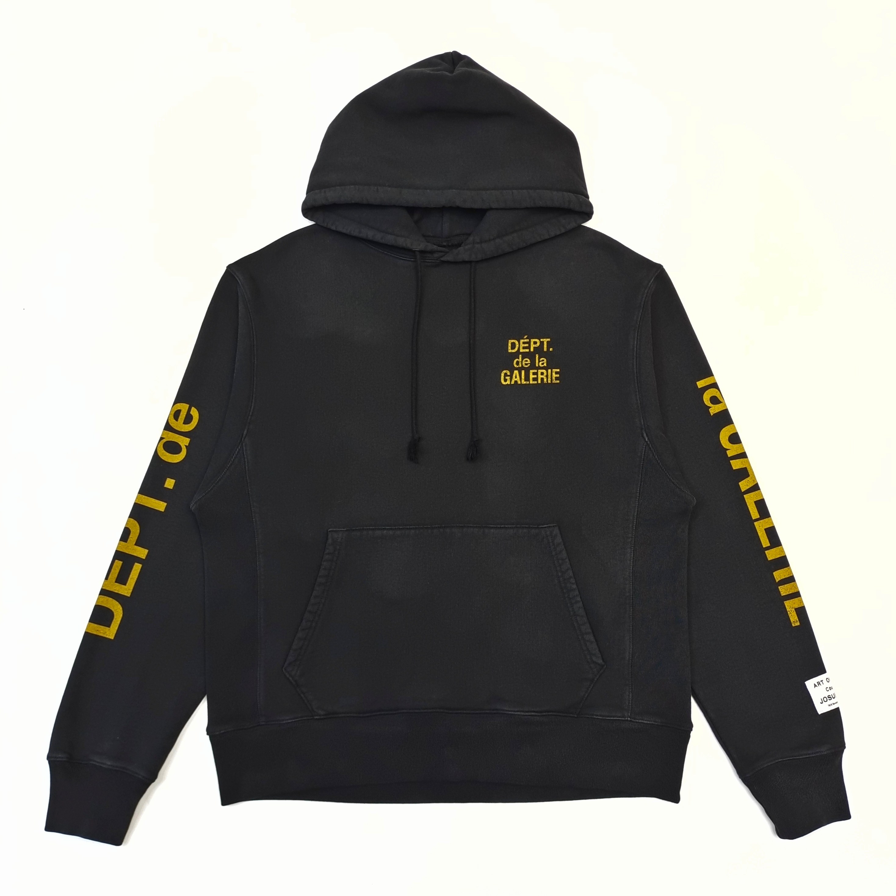 The black hooded T-shirt by Huang Fa Wen features natural cracks and patterns.