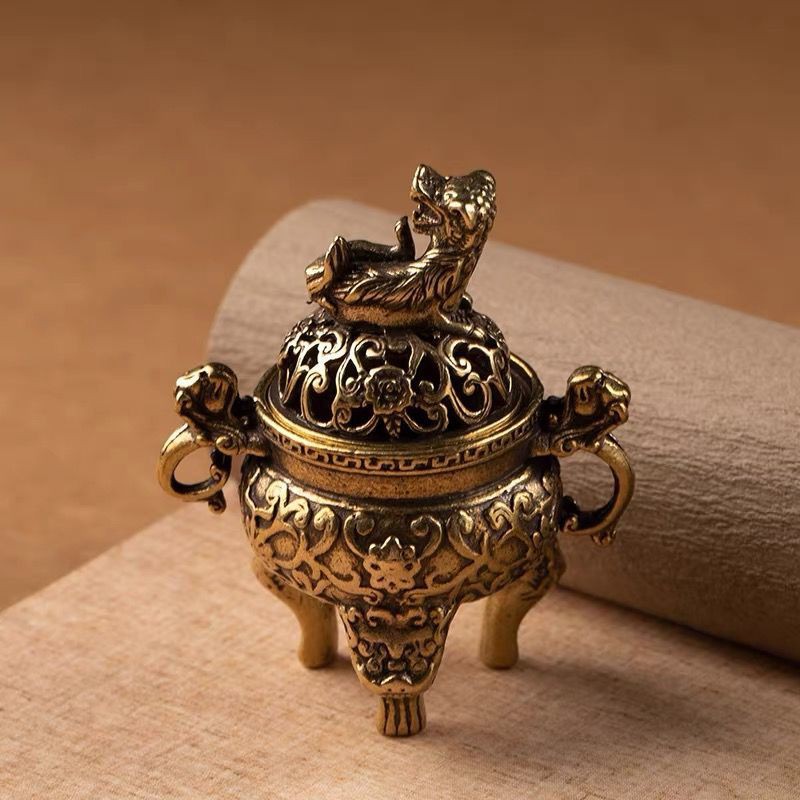 Kirin copper incense burner three feet two ears incense burner household mini Pixiu hollow flower tripod hand play round stove decoration