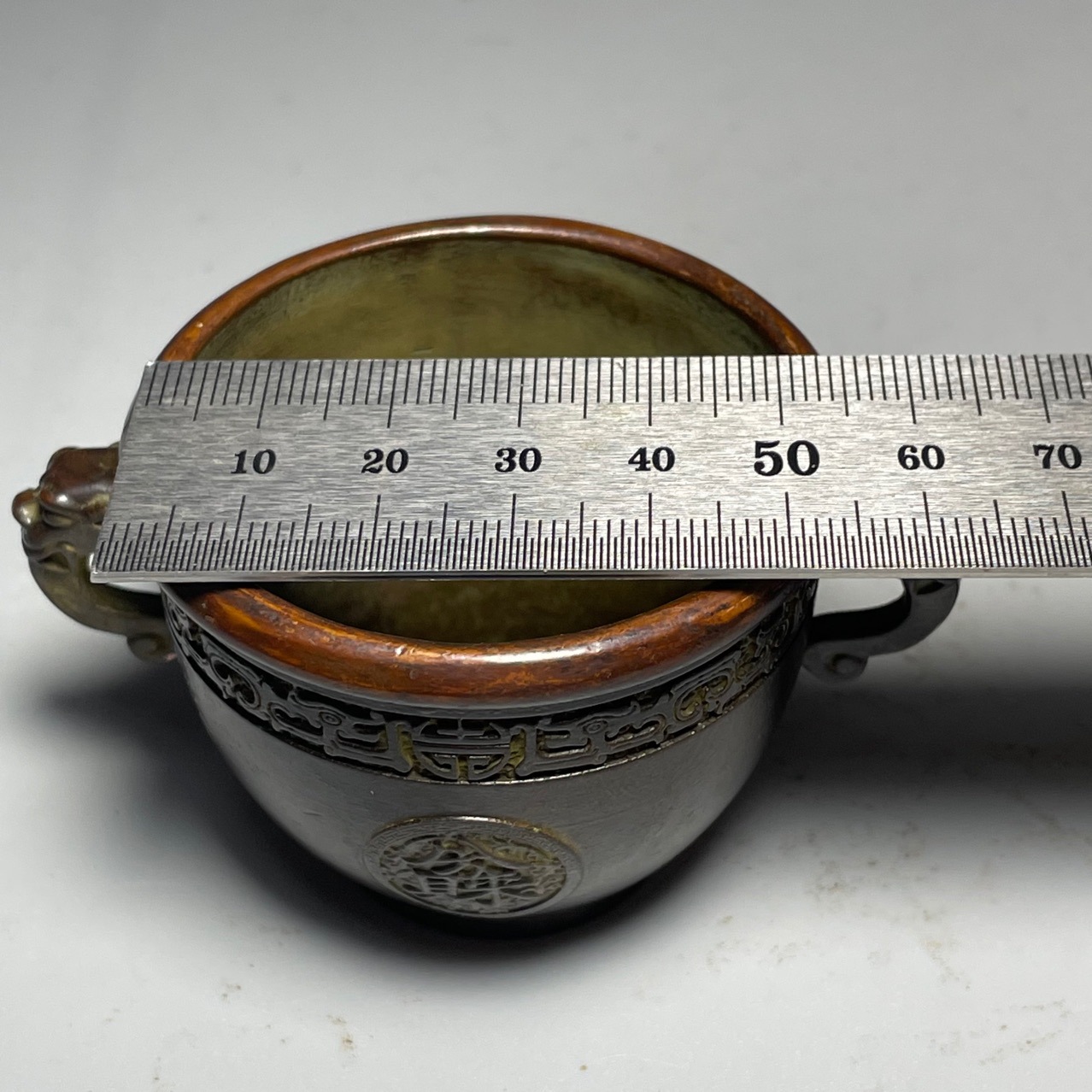 Recruiting wealth and bringing wealth from all directions, copper cylinder