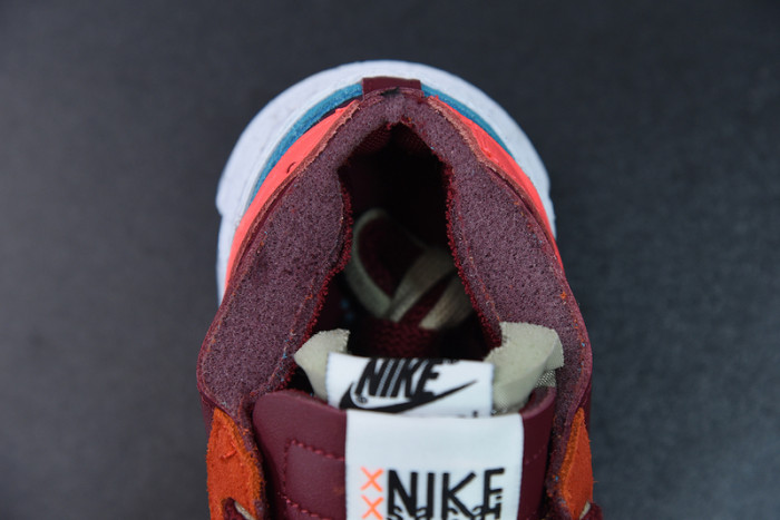 Nike Blazer Low sacai KAWS Red DM7901-600 - CCSHOES