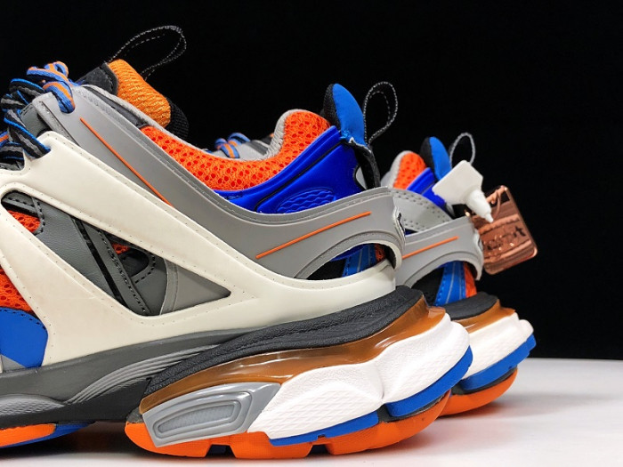 BLCG TRACK TRAINER 'ORANGE GREY' 542023 W1GB1 7580 - CCSHOES