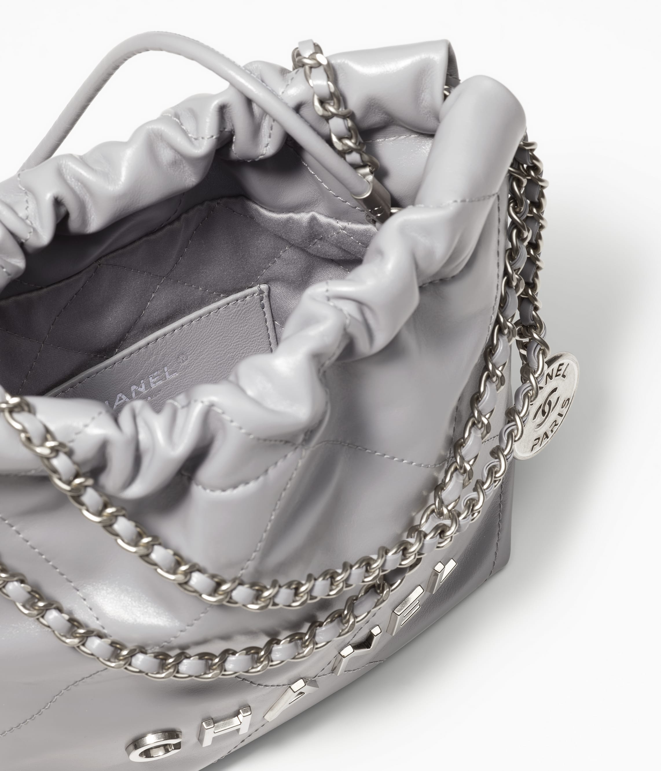 CHANEL 22 MINI HANDBAG Calfskin & Silver Metal Grey