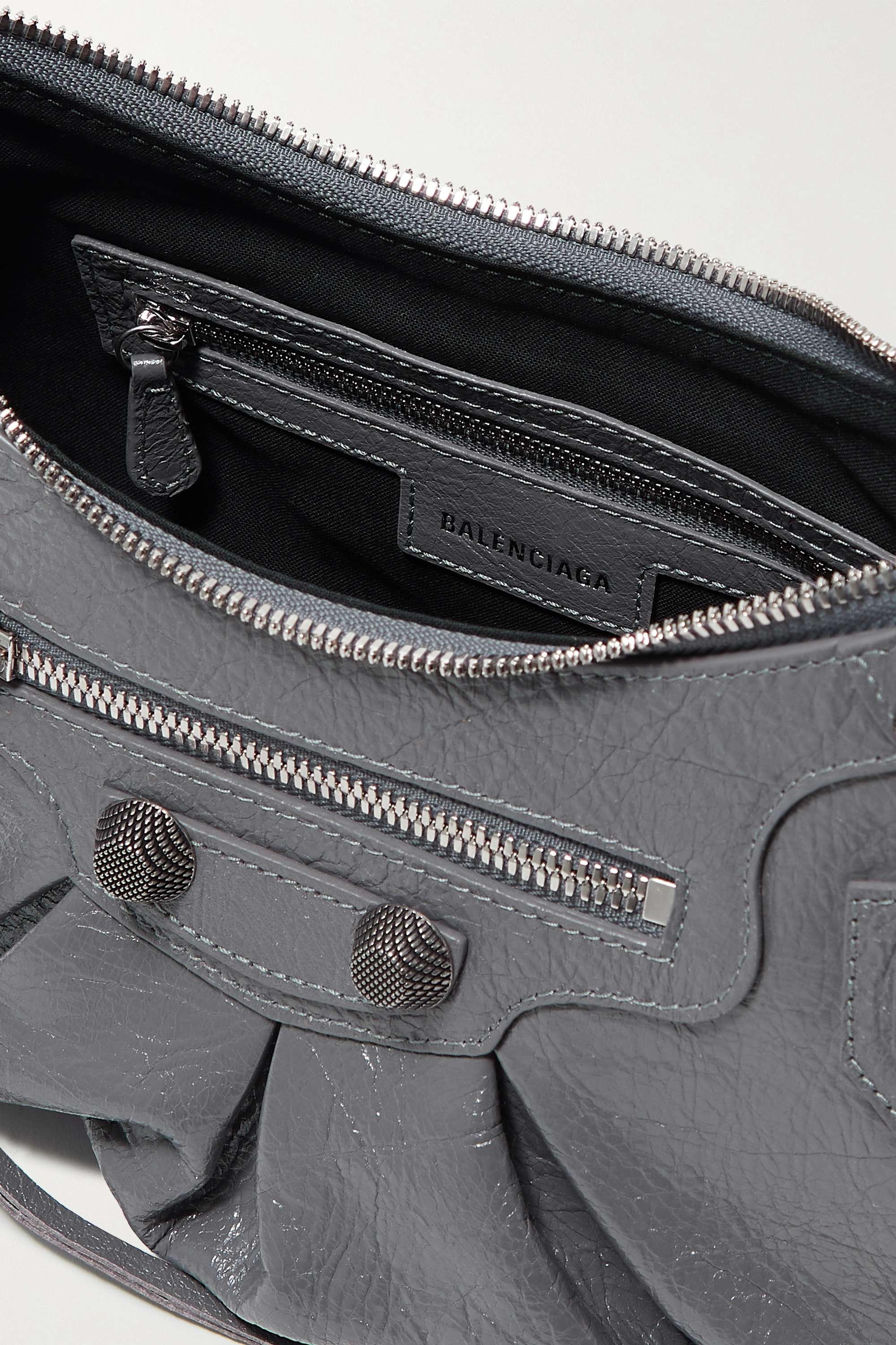 BALENCIAGA Le Cagole small studded crinkled-leather shoulder bag Grey