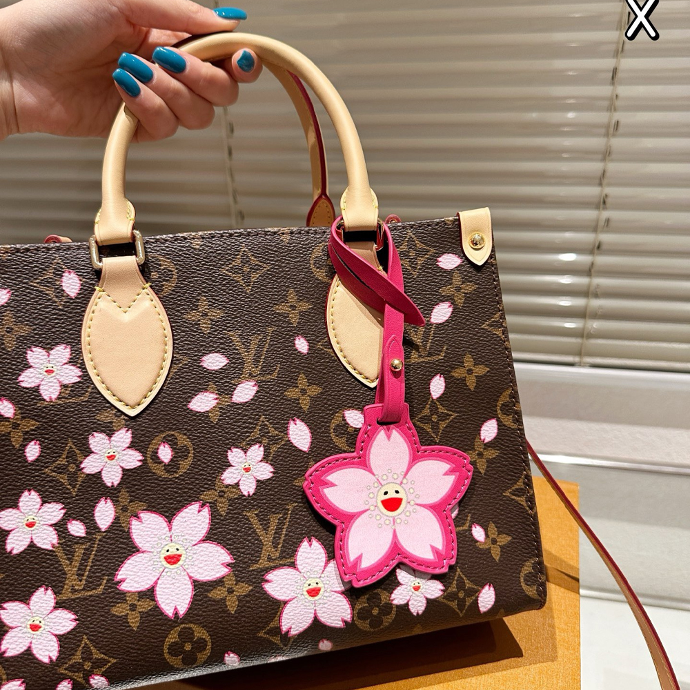 LV x TM OnTheGo PM Tote Bag