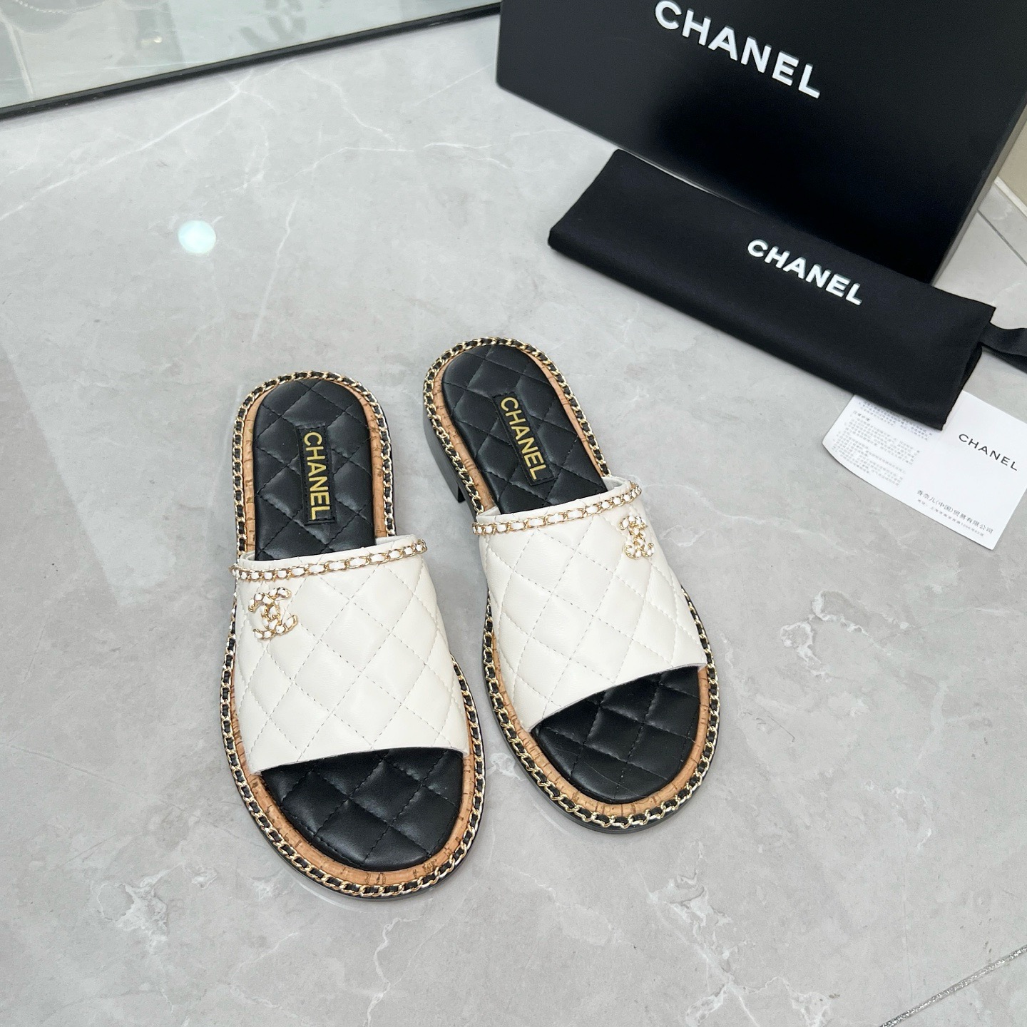 Chanel black leather sandals
