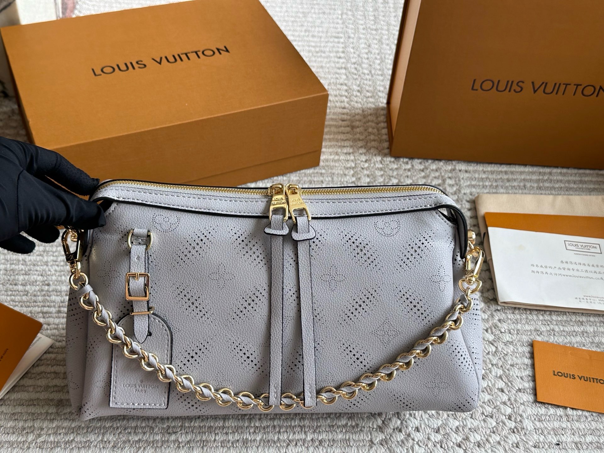 LV Hand It All MM Mahina Handbags