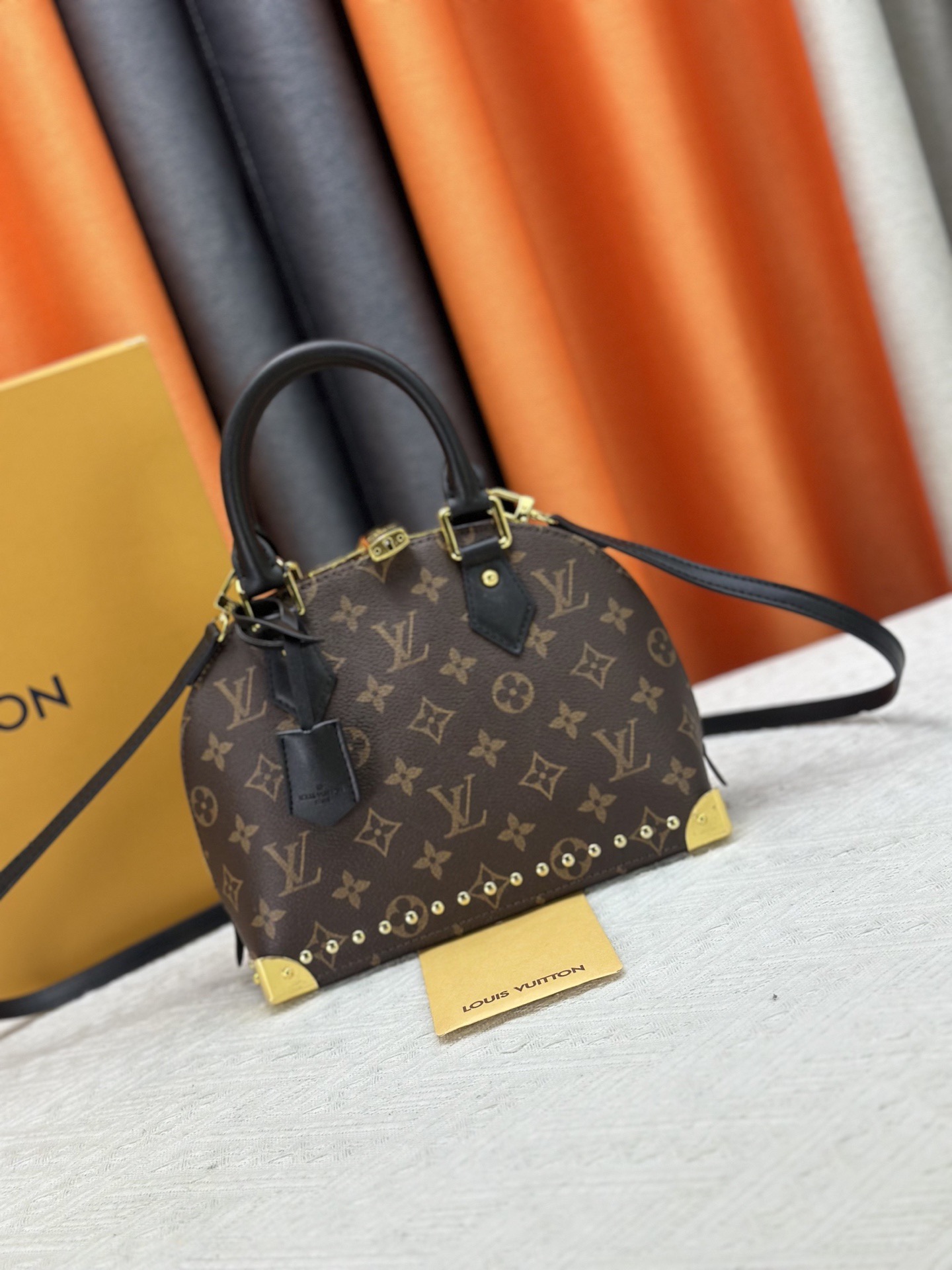 LV Alma Bridge Shell Bag
