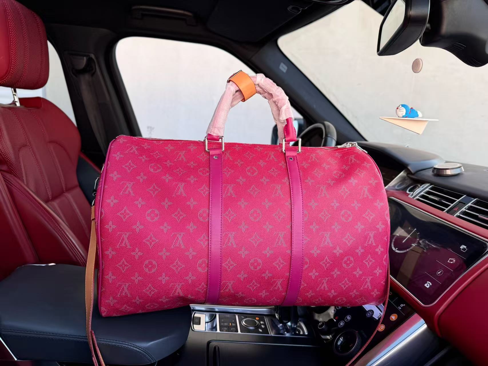 LV Keepall Bandouliere 50 Monogram Heritage