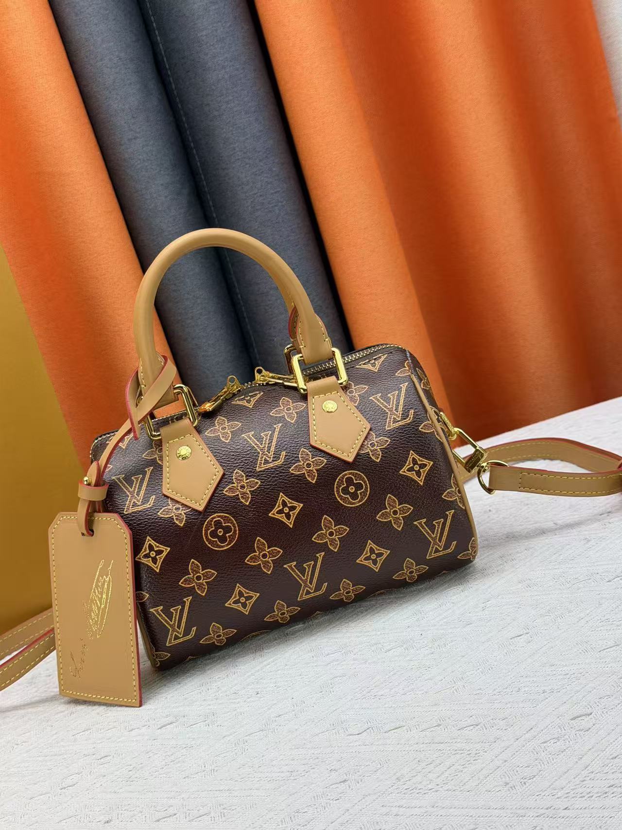 LV Speedy Bandoulière 20 Handbag