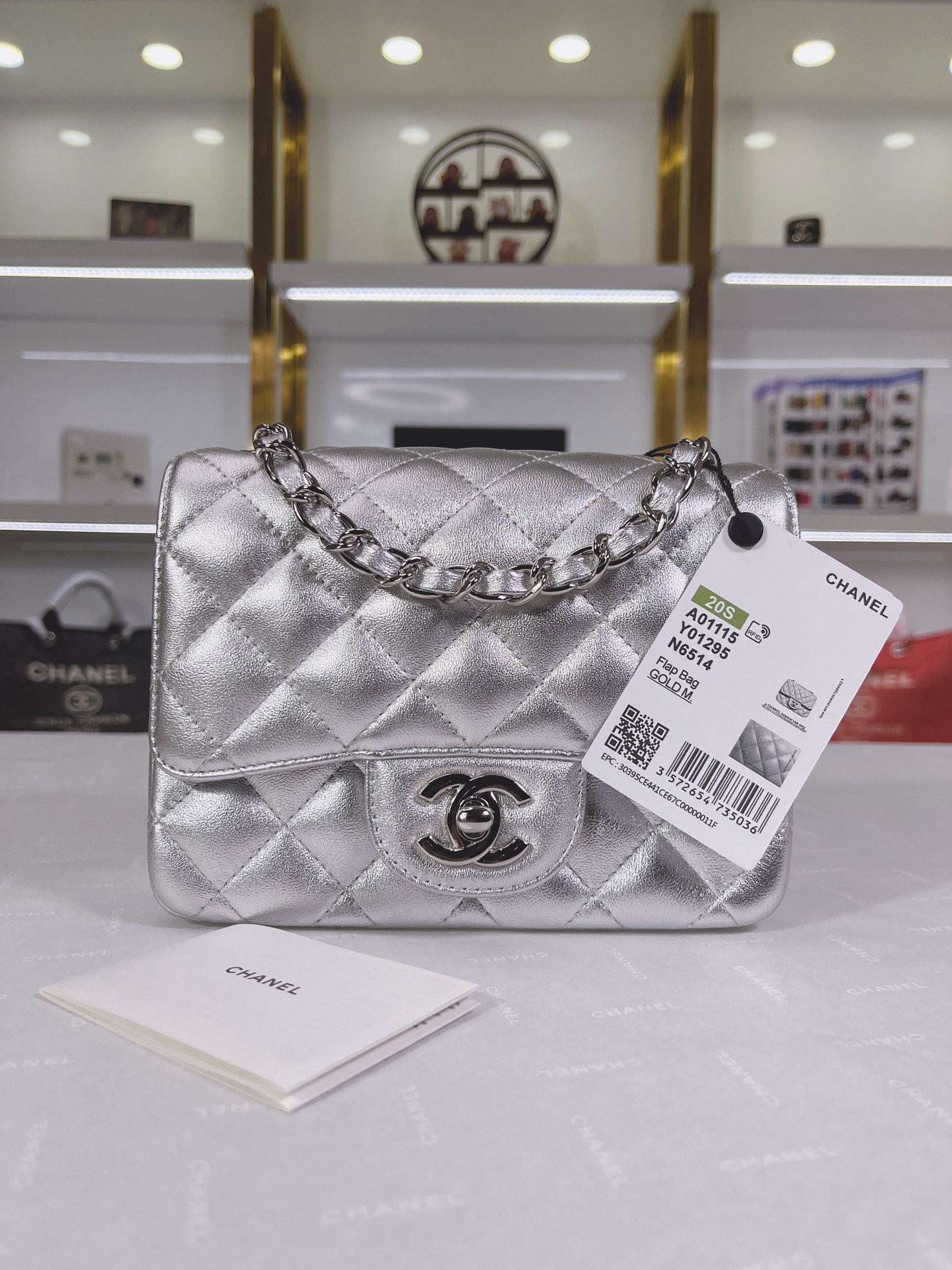 Chanel Quilted Silver Flap Bag