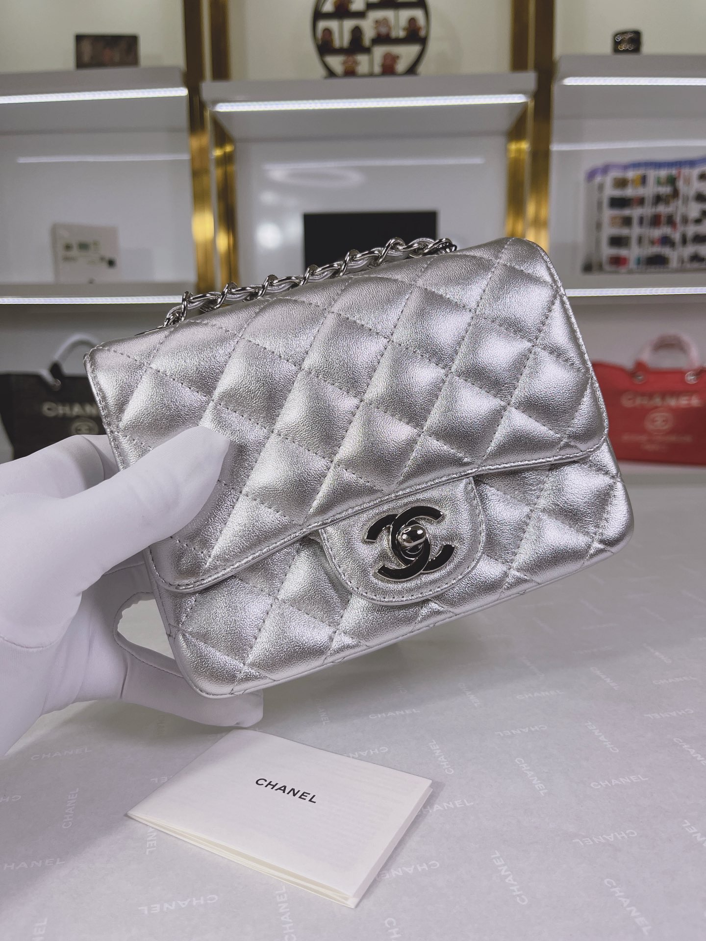 Chanel Quilted Silver Flap Bag
