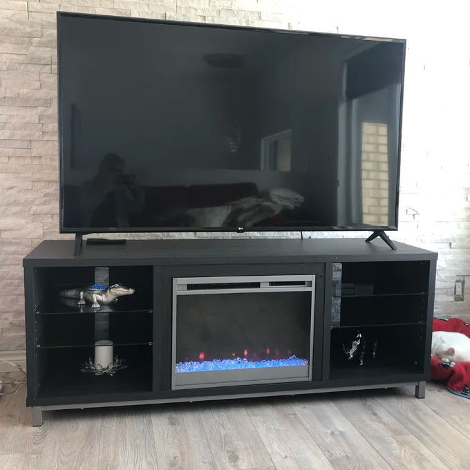 Vaske TV Stand for TVs up to 70 with Fireplace Included.