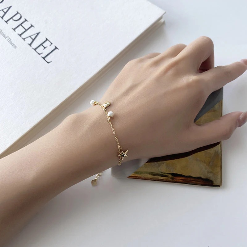 Pearl charm bracelet 01