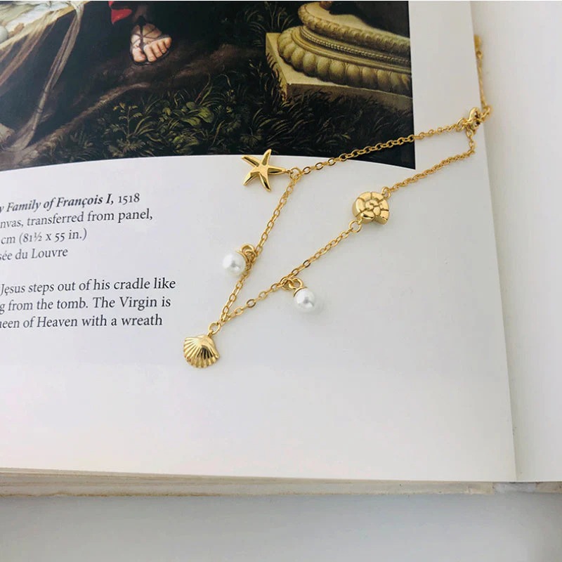 Pearl charm bracelet 01