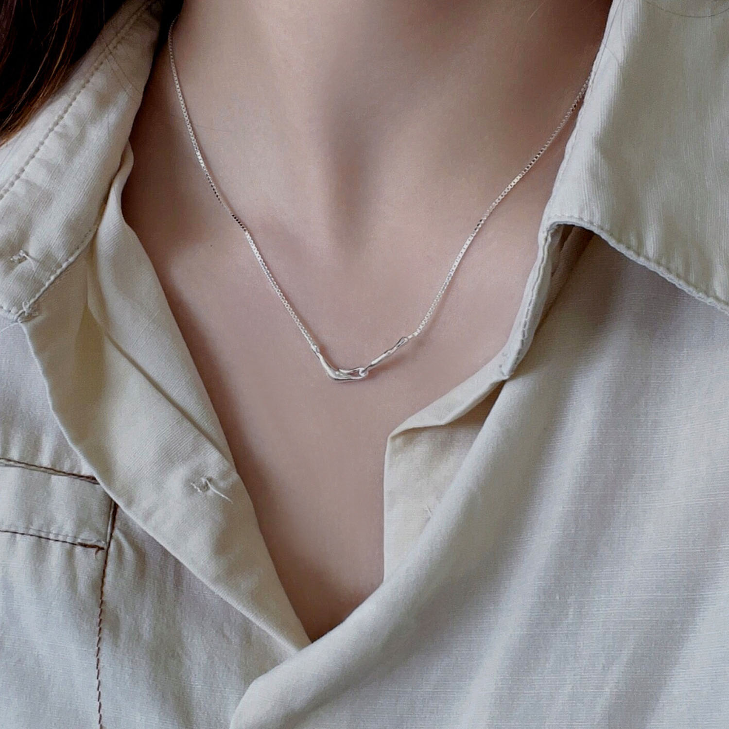 Love bone pendant necklace