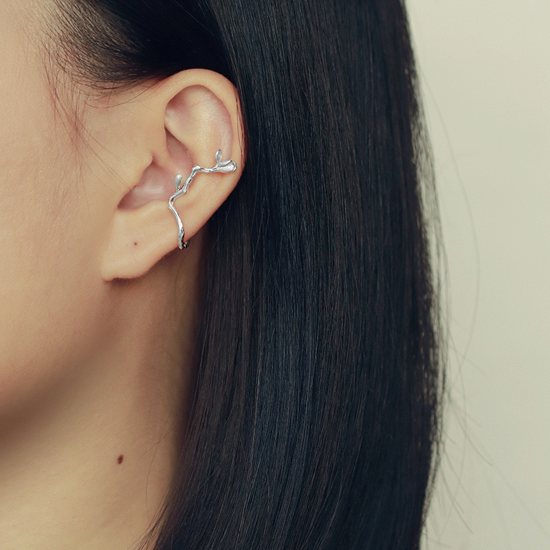 Blooming magnolia flower ear cuff
