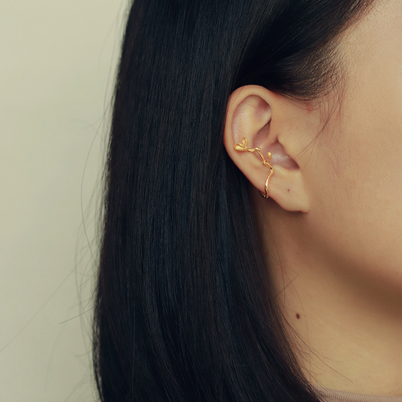 Blooming magnolia flower ear cuff