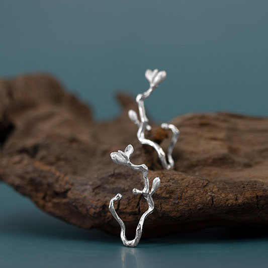 Blooming magnolia flower ear cuff