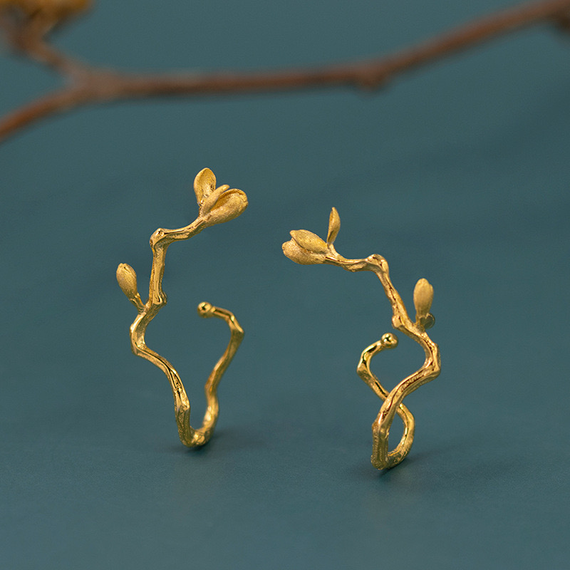 Blooming magnolia flower ear cuff