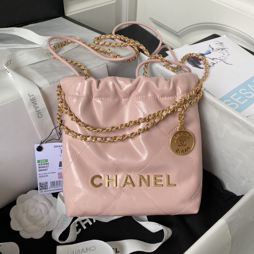 CHANEL CHANEL 22 Mini Handbag Shiny Calfskin & Gold-Tone Metal Light Pink- AS3980