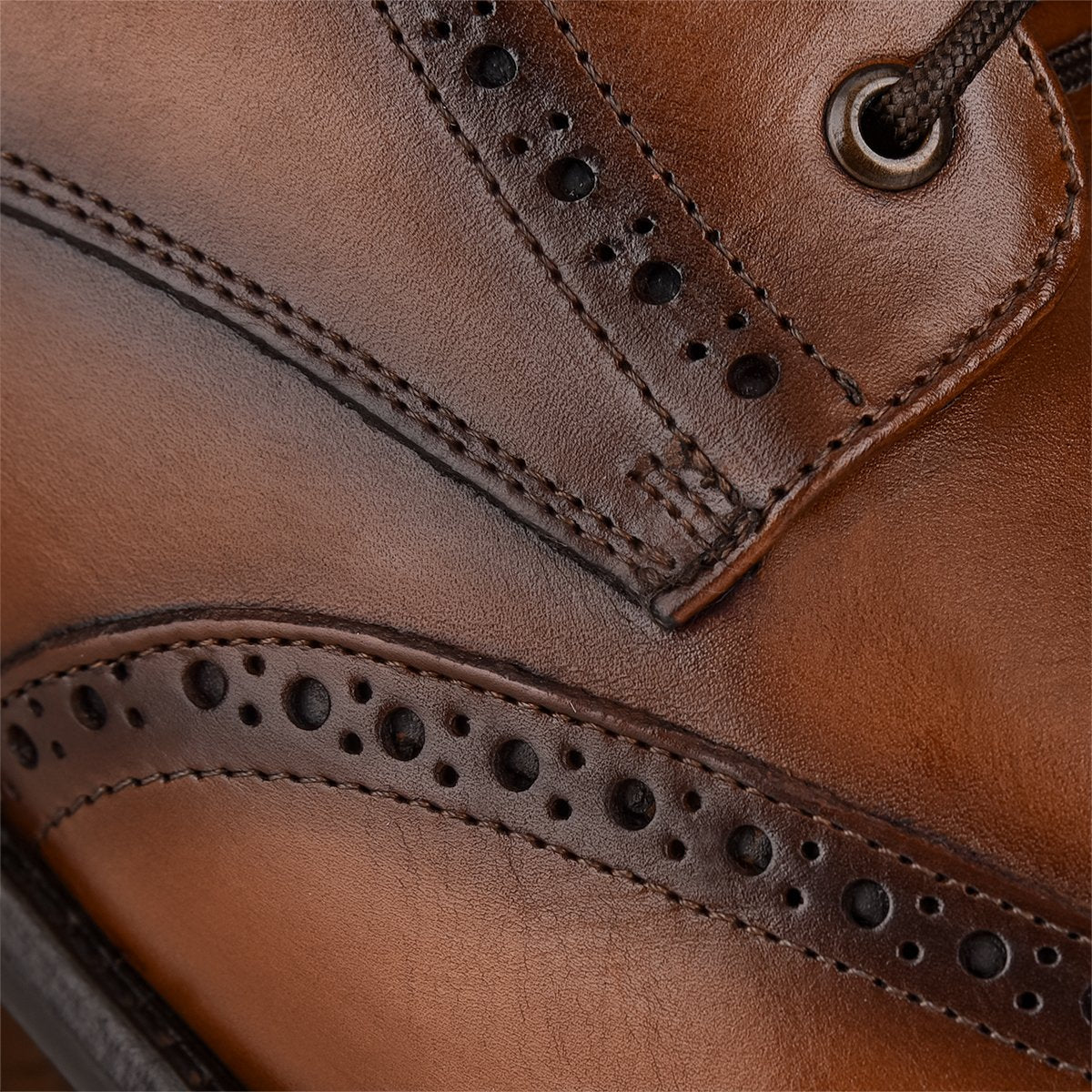 Botín para hombre con brocado