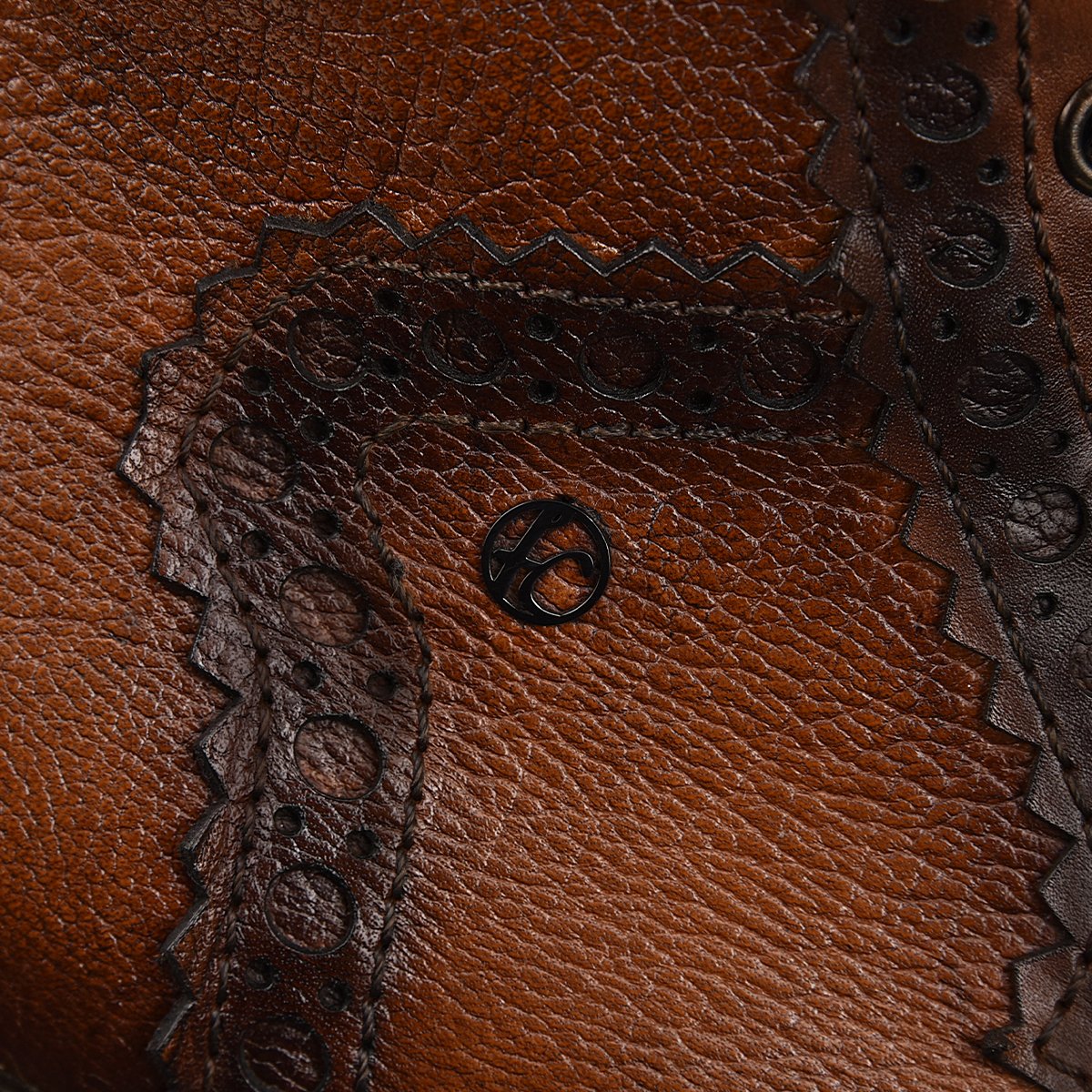 Botín para caballero en piel genuina.