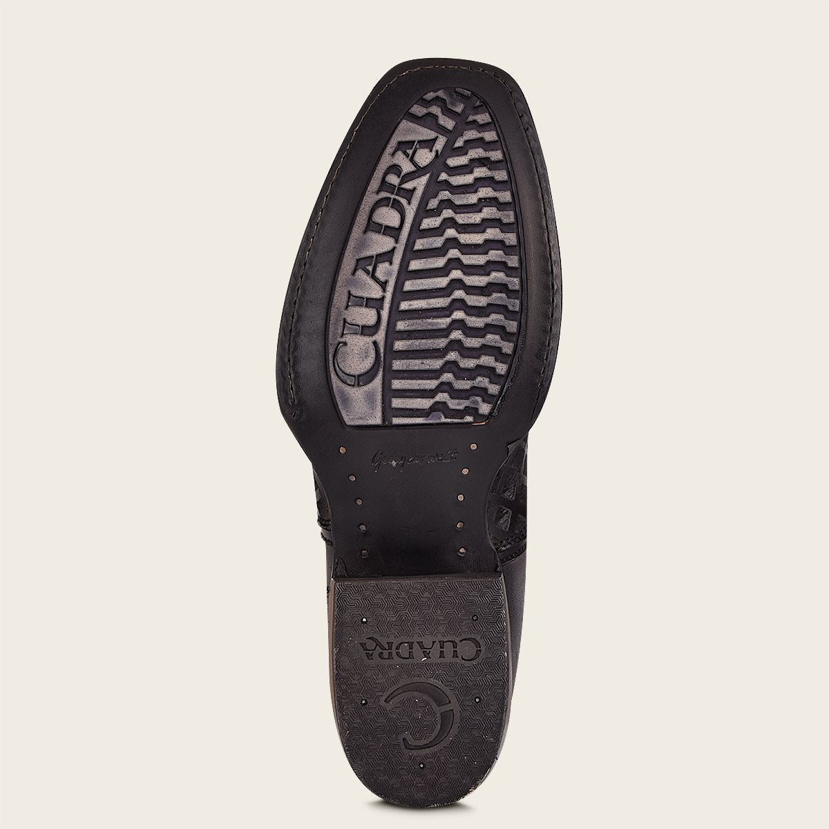 Bota de piel grabada