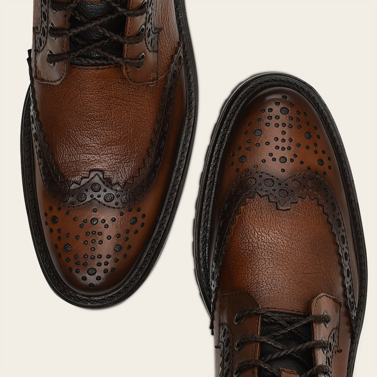 Botín para caballero en piel genuina.